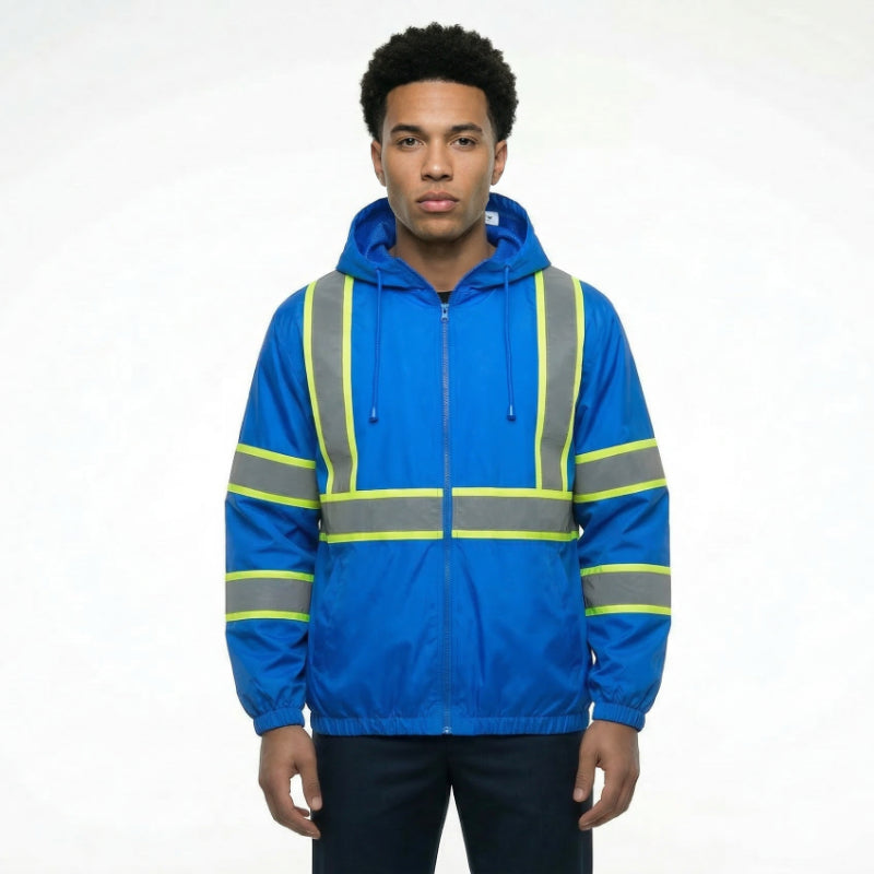 Person wearing a blue safety jacket with reflective stripes on a white background