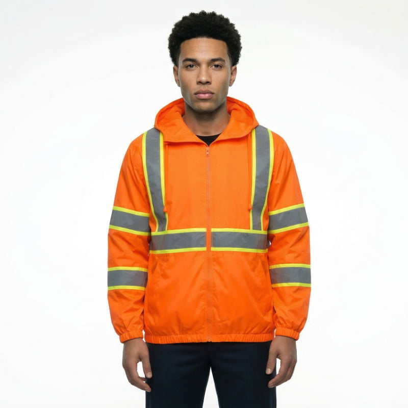 Person wearing an orange safety jacket with reflective stripes on a white background